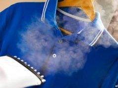 Ropa perfecta con el centro de planchado